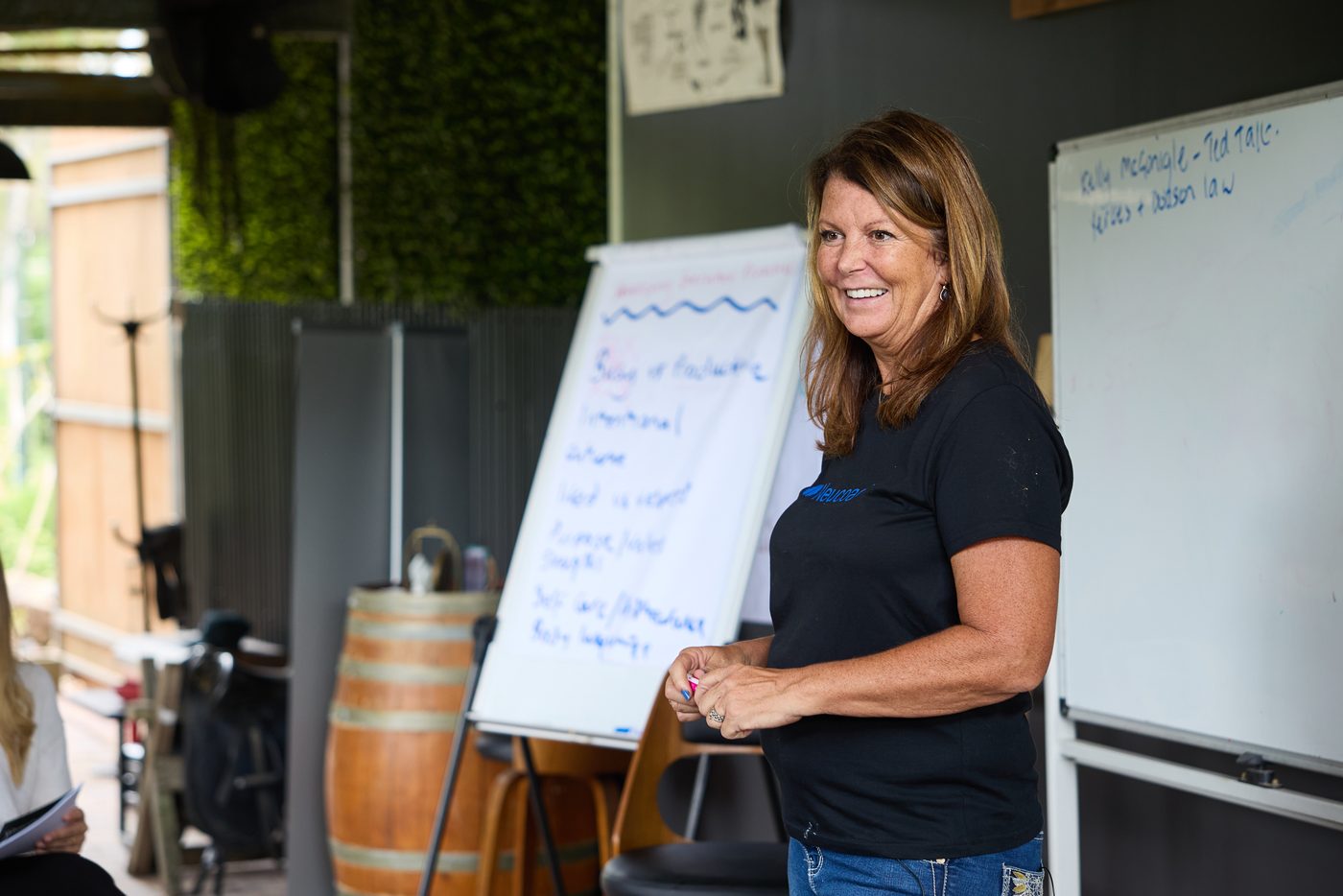 Paula Johnston facilitating a leadership session in the NeuCoach barn learning environment.