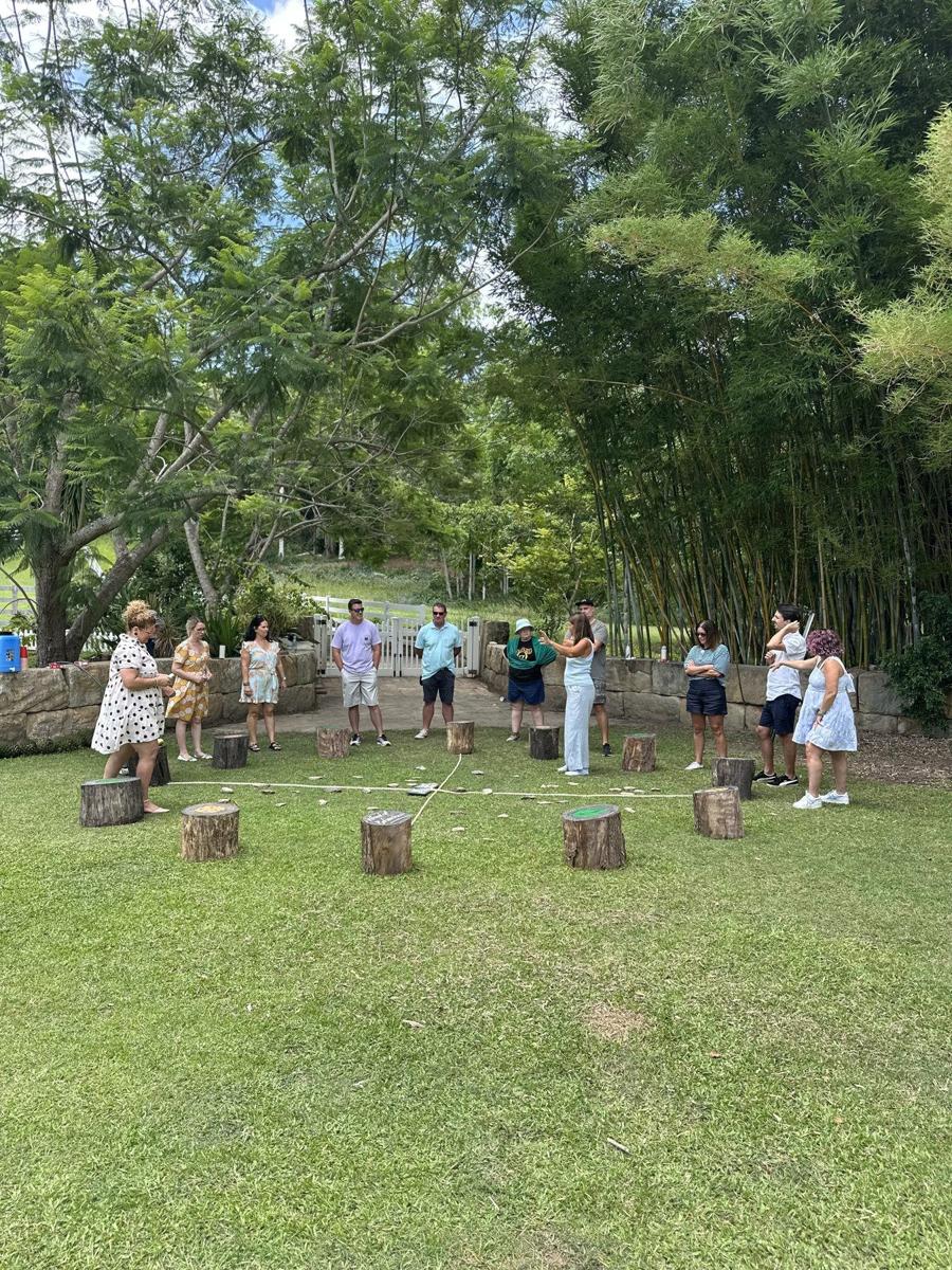 A NeuCoach team taking part in an outdoor, nature-based leadership session in the Gold Coast Hinterland.